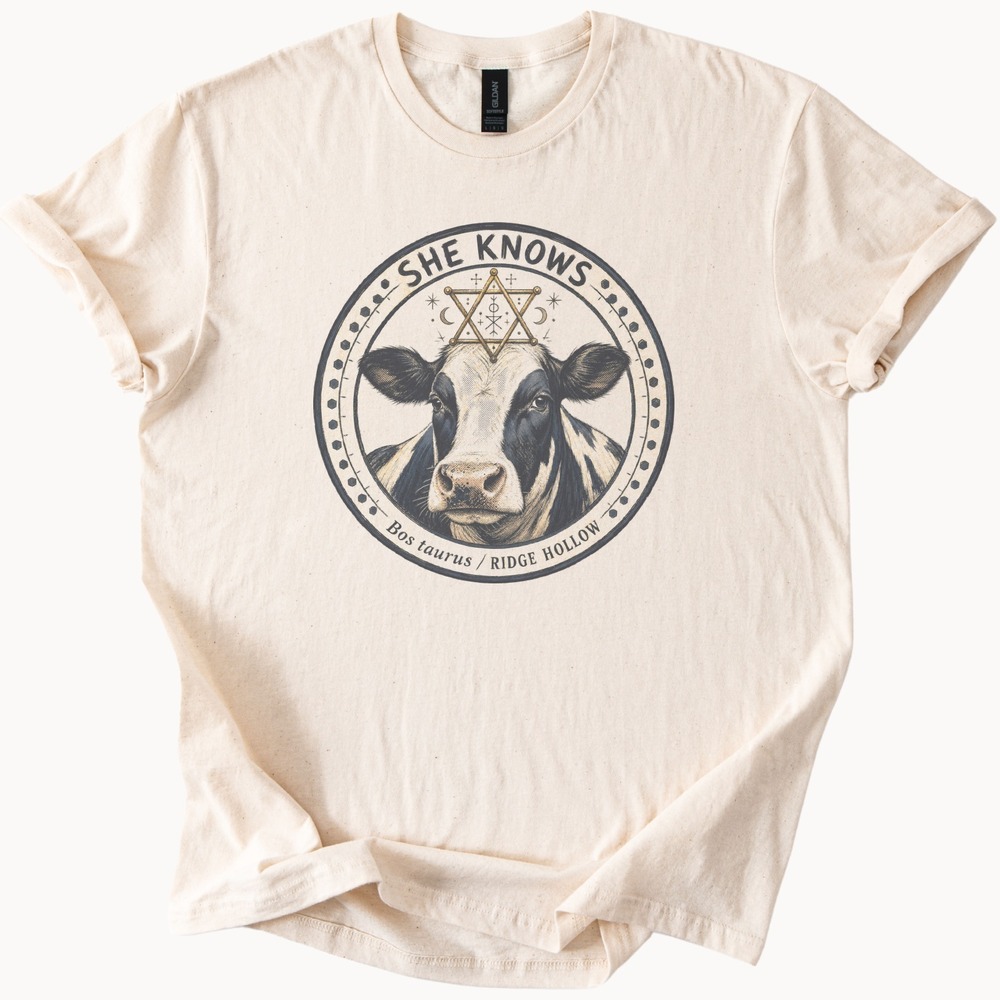 She Knows Dairy Cow Esoteric Badge Tee